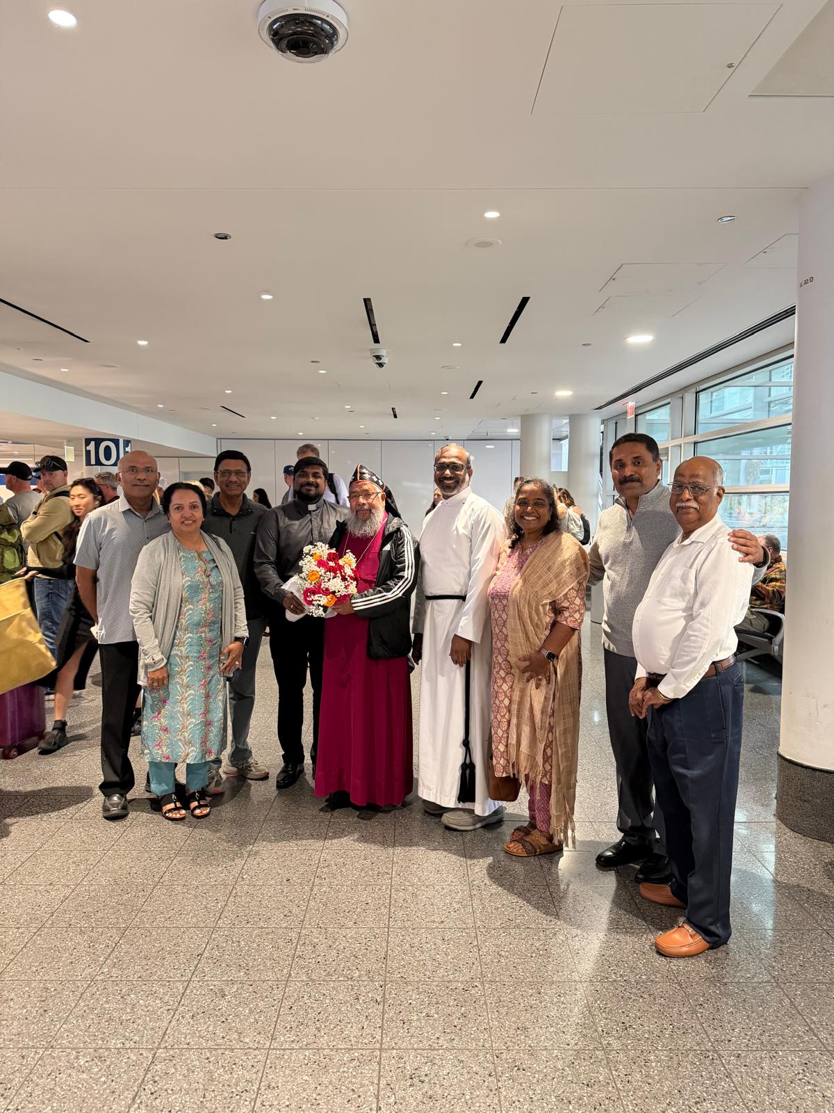 Welcoming the Bishop at the airport